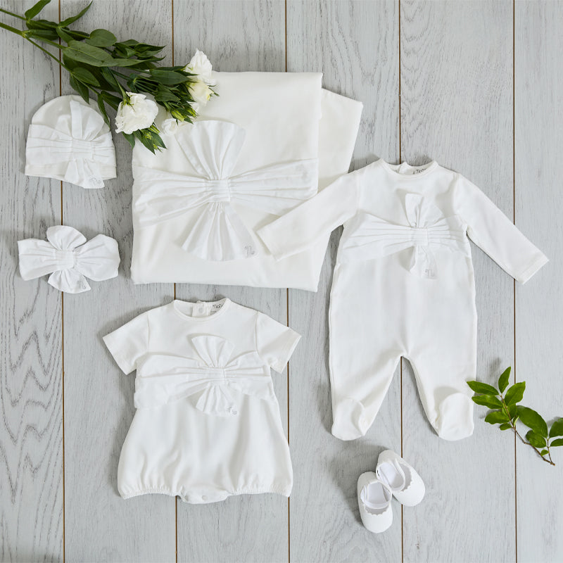 nanan-tutina-off-white-neonata-con-fiocco-frontale image 1